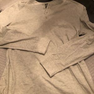 Men’s cotton long sleeve shirt with buttons.